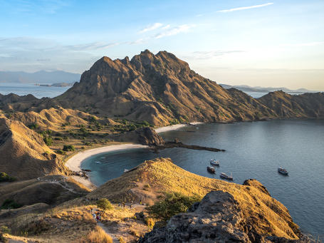 The beautiful underwater world at Padar Island. In the picture you can see fish and corals through turquoise clear water